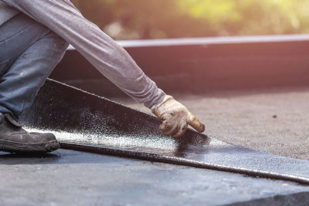 Professional Basement Waterproofing technician working in Jacksonville, NC